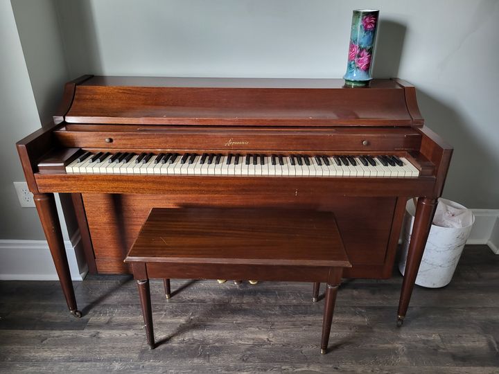 Upright piano with bench (Piano Moving Services) by Moving Pros CLE