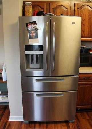 Stainless French-door refrigerator installed in a kitchen (Pickup and delivery services) by Moving Pros CLE
