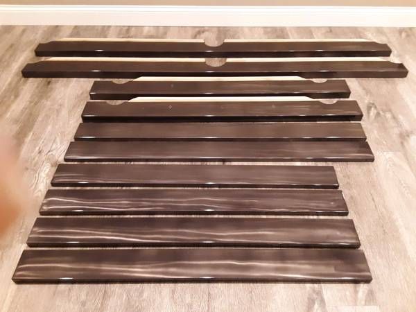 Pool table rails laid out during disassembly (Pool Table Moving Services) by Moving Pros CLE
