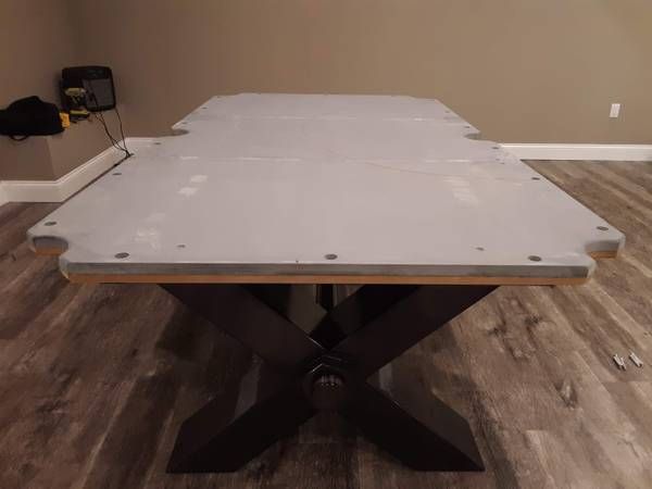 Pool table slate set on the frame (Pool Table Moving Services) by Moving Pros CLE