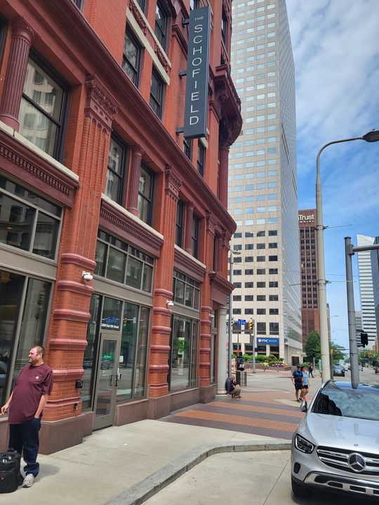 Historic red-brick building downtown ((no own label; sits before a Drive chip and the label Senior Moving Services; placed on Senior Moving per Mike 2026-10-18 4:55 PM)) by Moving Pros CLE